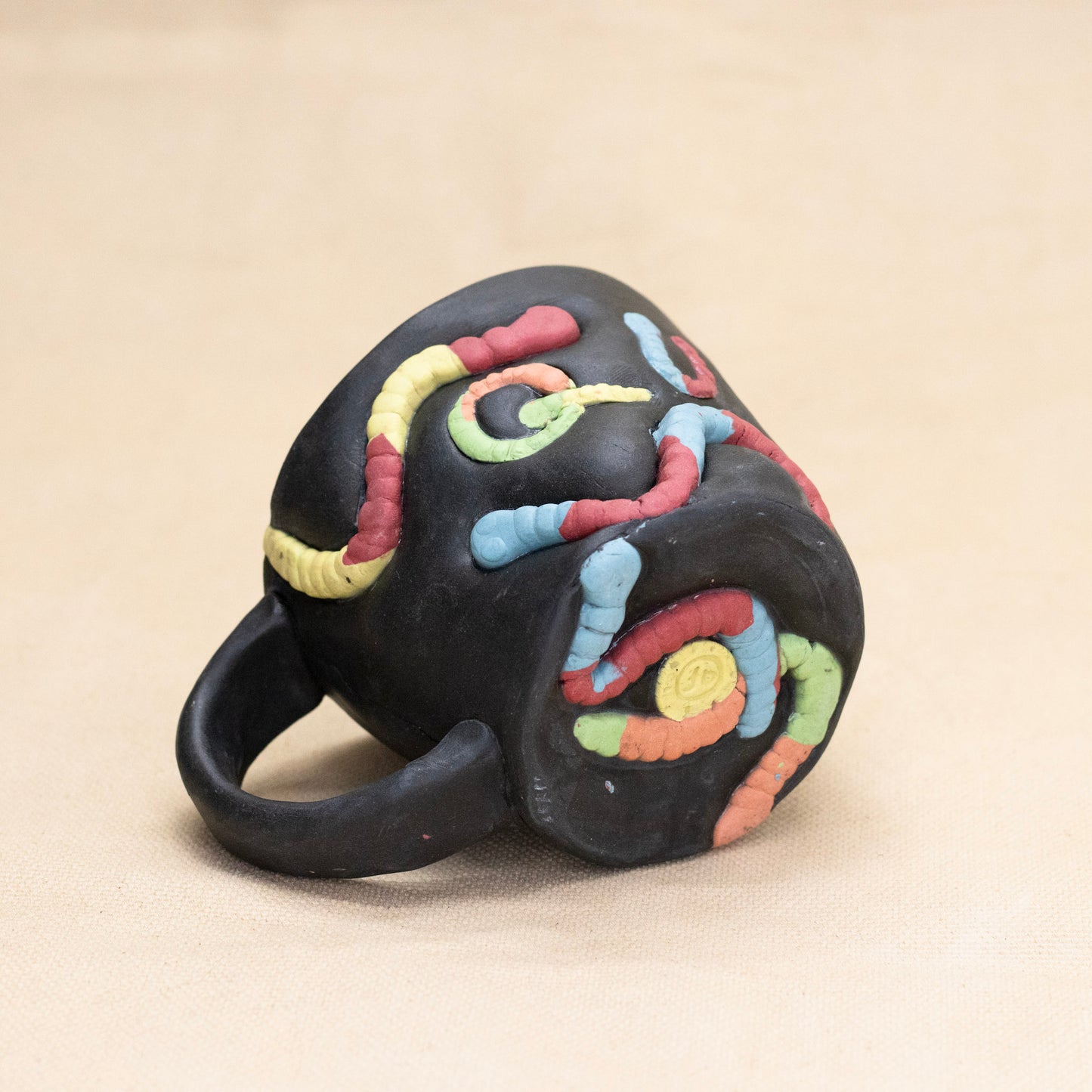 Queer Gummy Worm Mug by Amber Frances