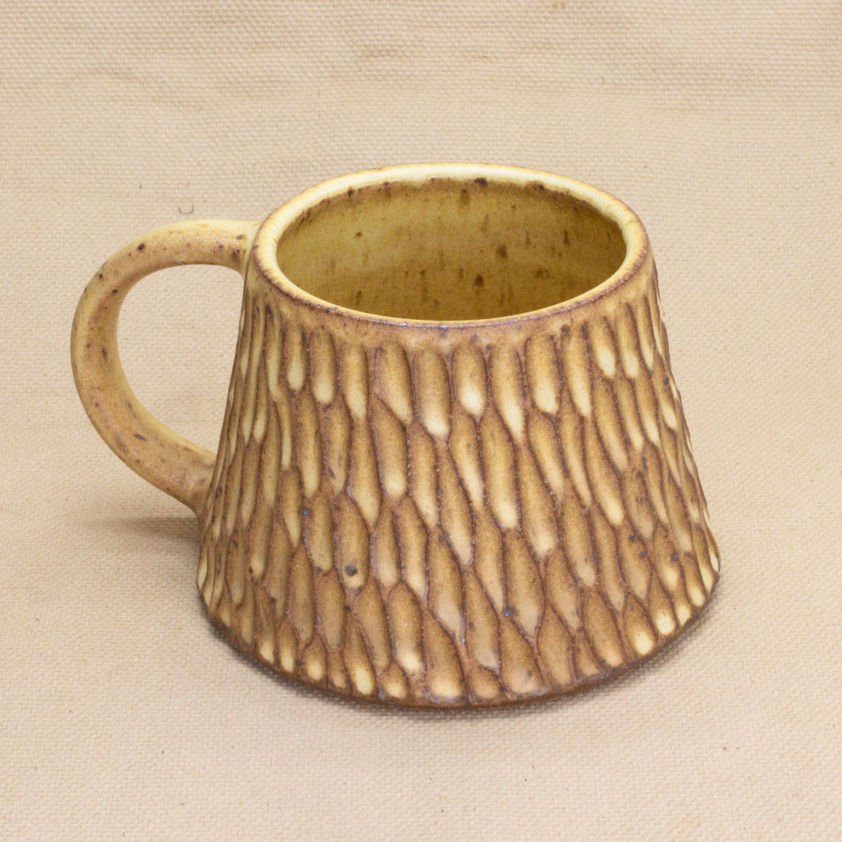 Hand-Carved Yellow Mug by Jennifer Nerad