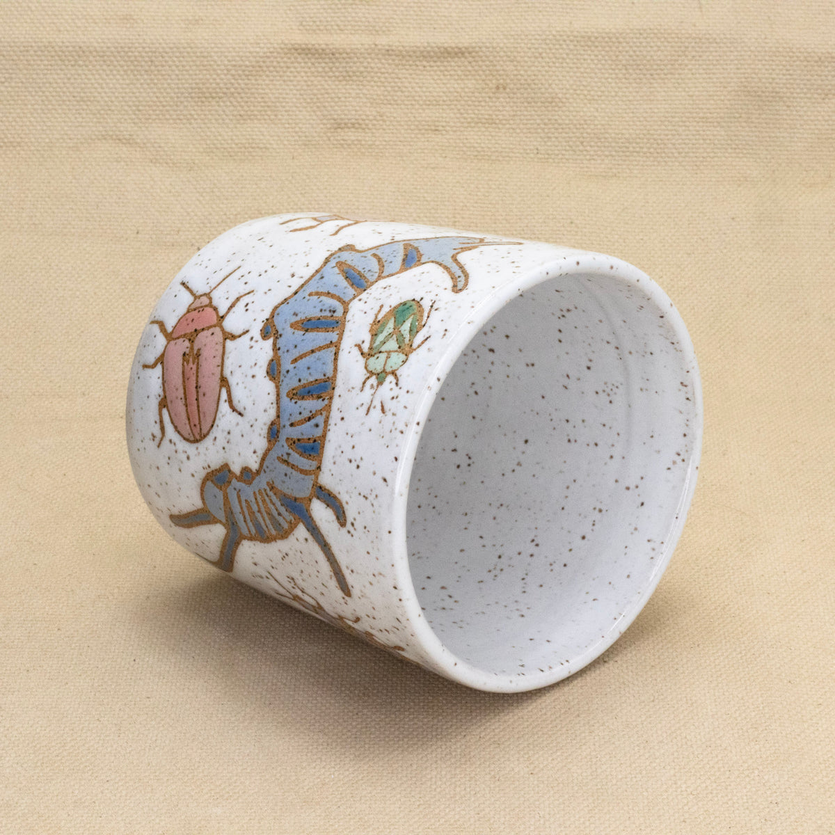 White Bug Cup by Jess Wiseheart