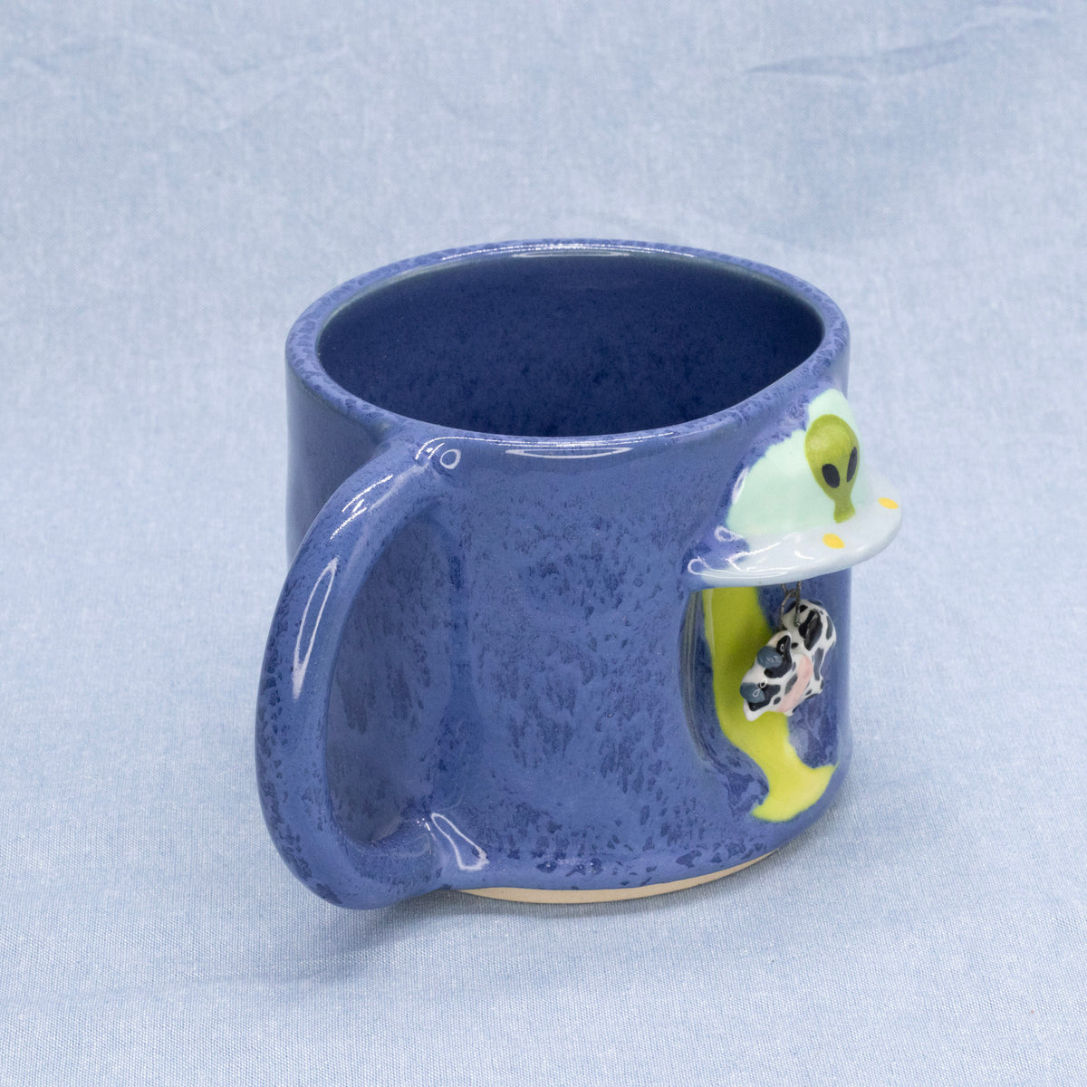 Cow Abduction Mug by Capy Clay Ceramics