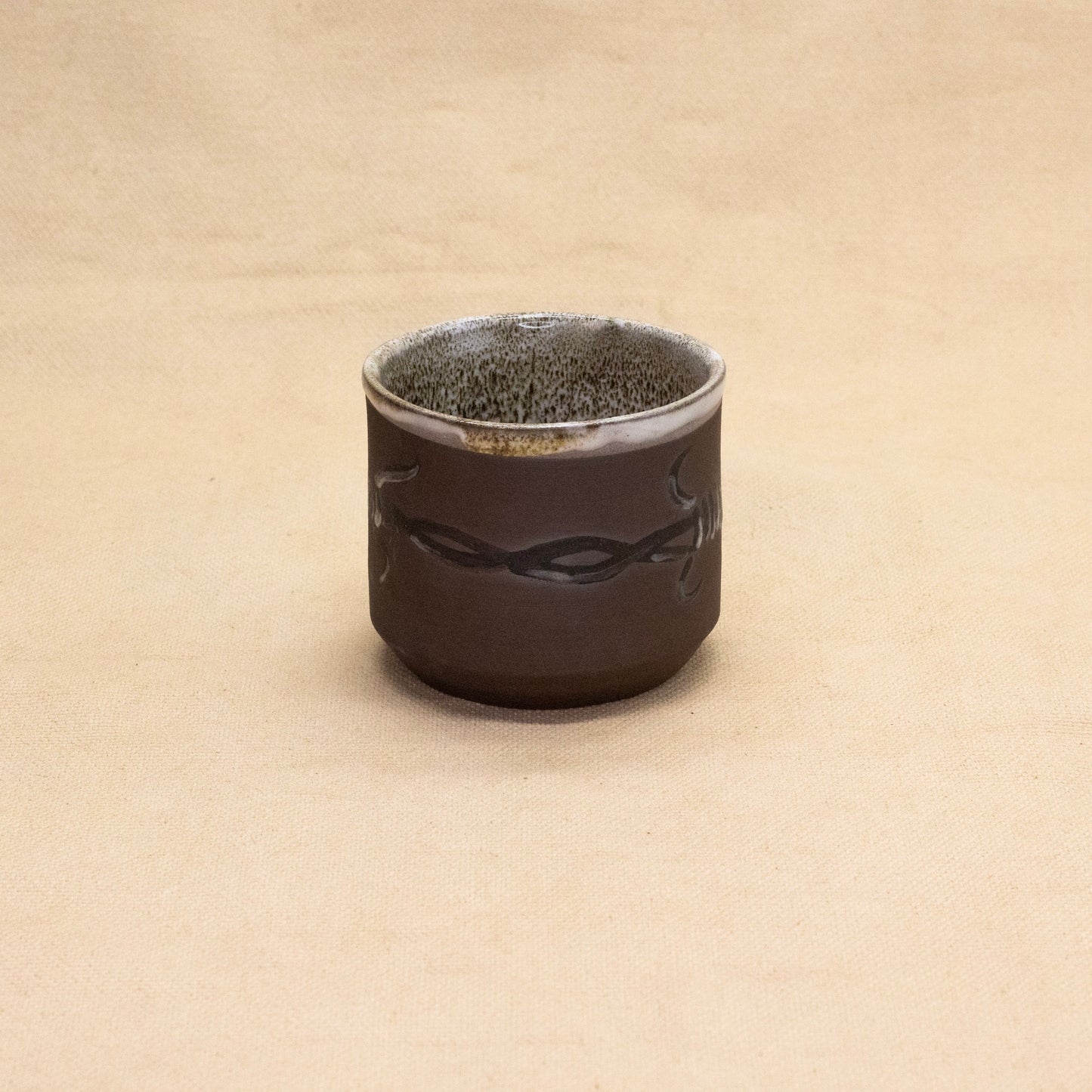 Barbed Wire Cup by Tommy Schaefer