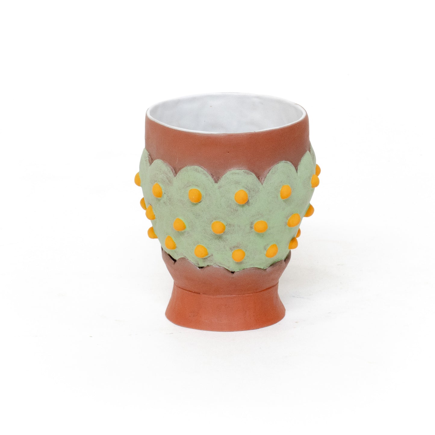 Green Cup-cake with Yellow Sprinkles by Naomi Peterson