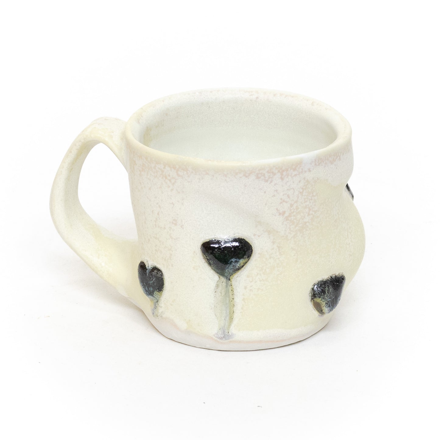 Black Hearts Mug by Liz Mazurek