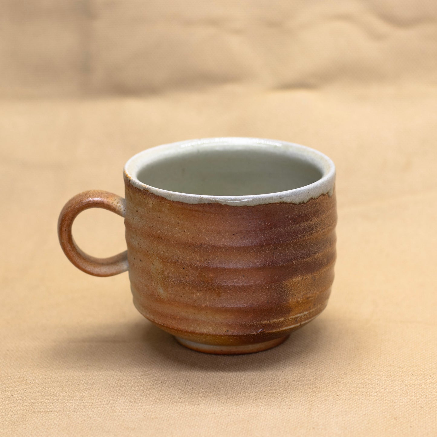 Soda-Fired Solar Mug by Sarah Steininger Leroux