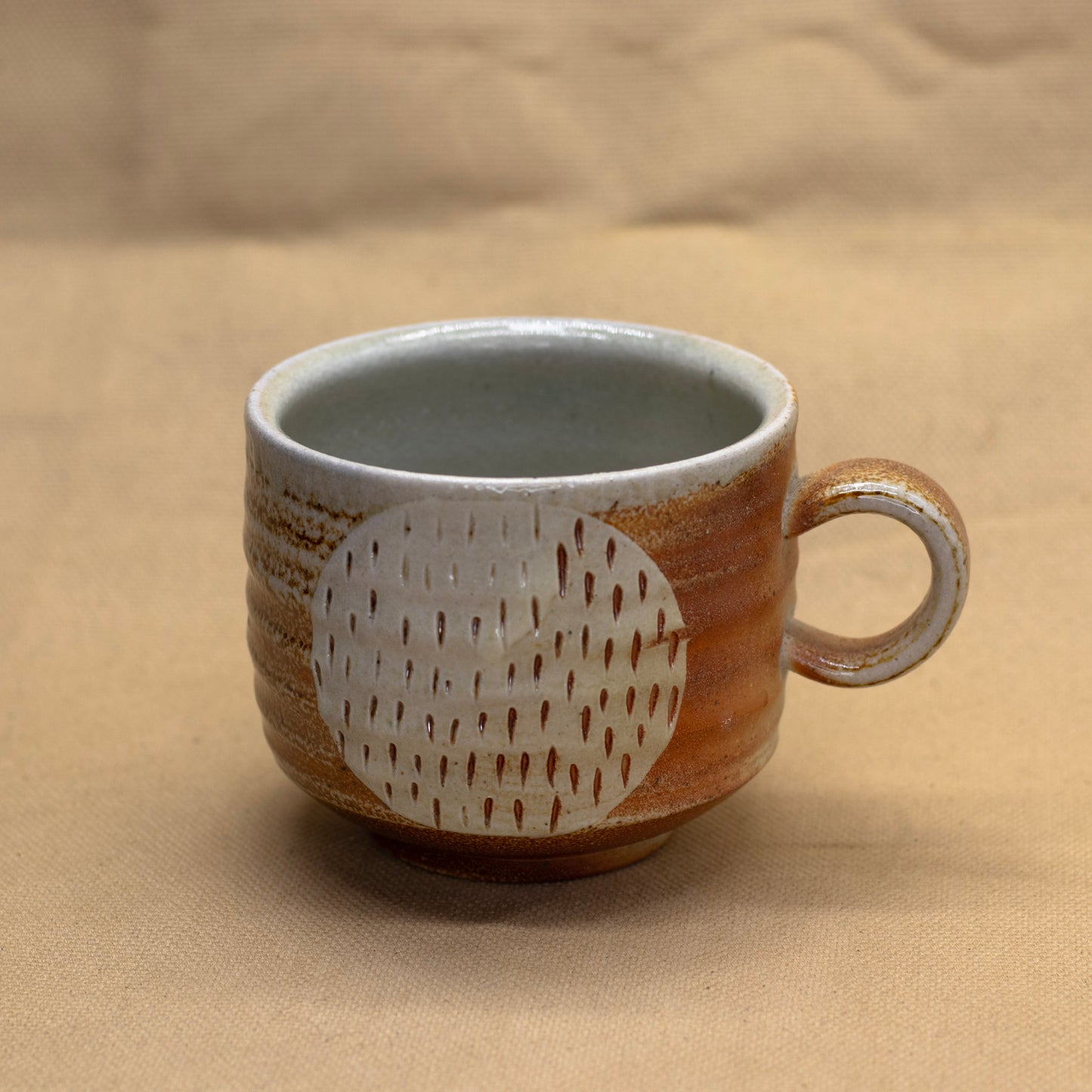 Soda-Fired Solar Mug by Sarah Steininger Leroux