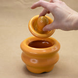 Lidded Jar (Orange) by Sisters Slipworks