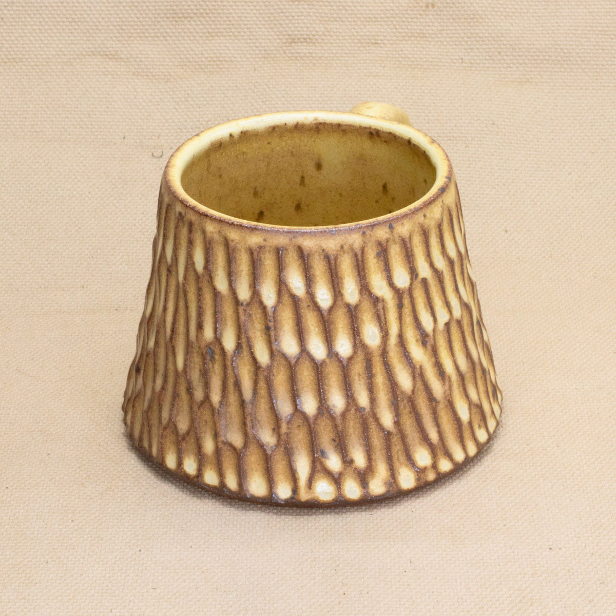 Hand-Carved Yellow Mug by Jennifer Nerad