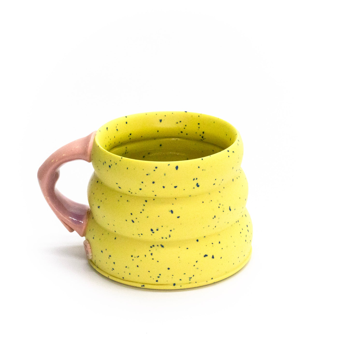 Yellow candy crunch mug by Brian Sarama