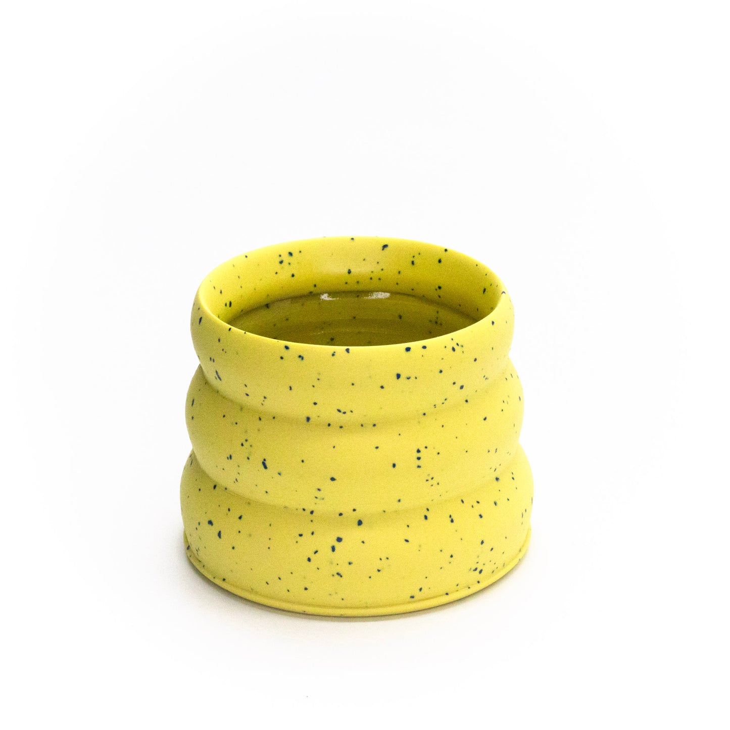 Yellow candy crunch mug by Brian Sarama