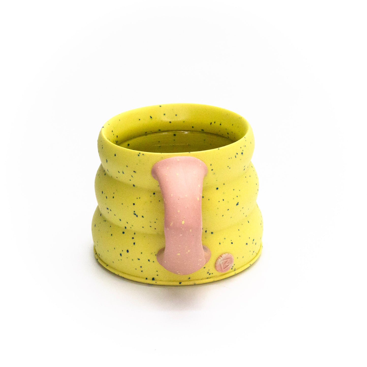 Yellow candy crunch mug by Brian Sarama