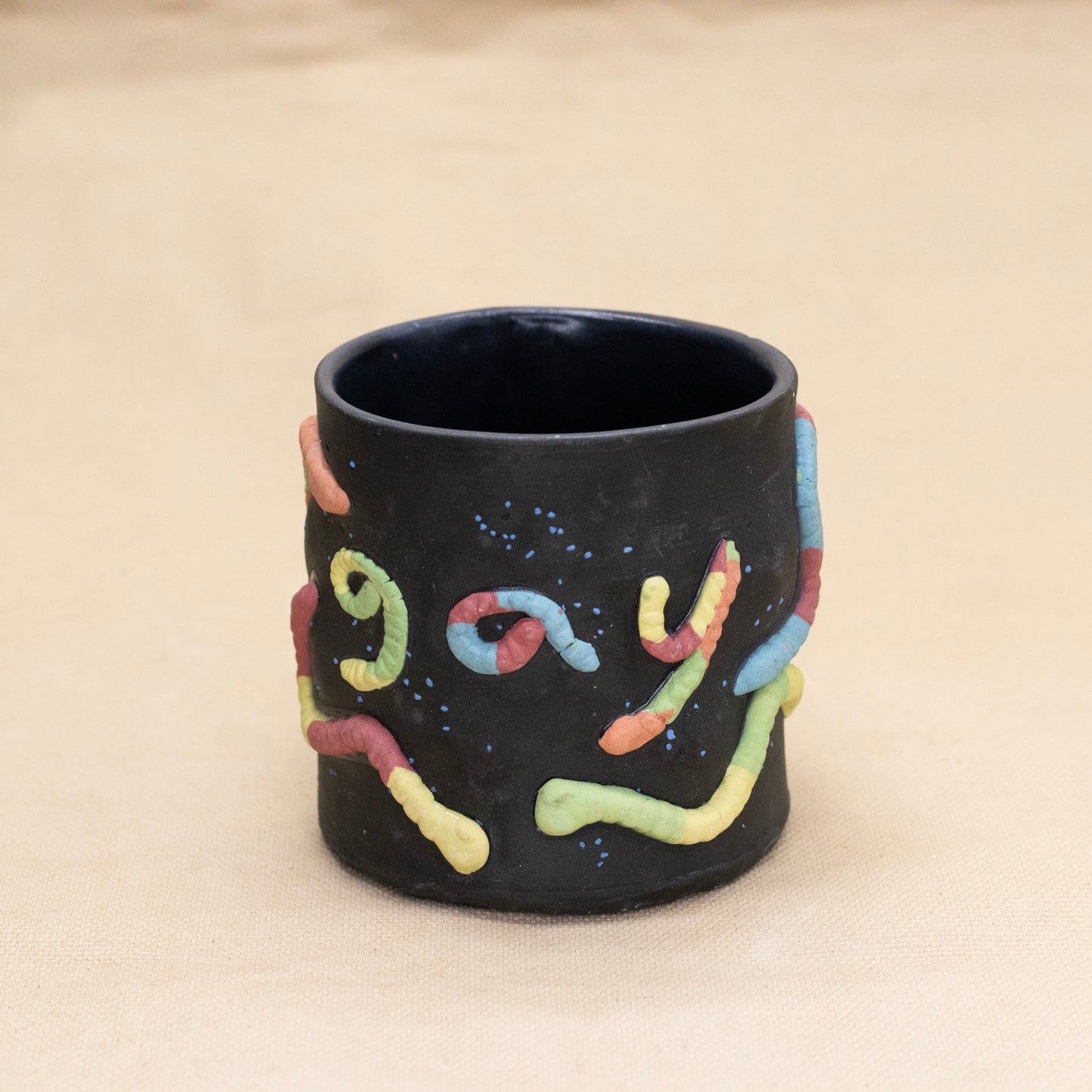 Gay Gummy Worm Mug by Amber Frances