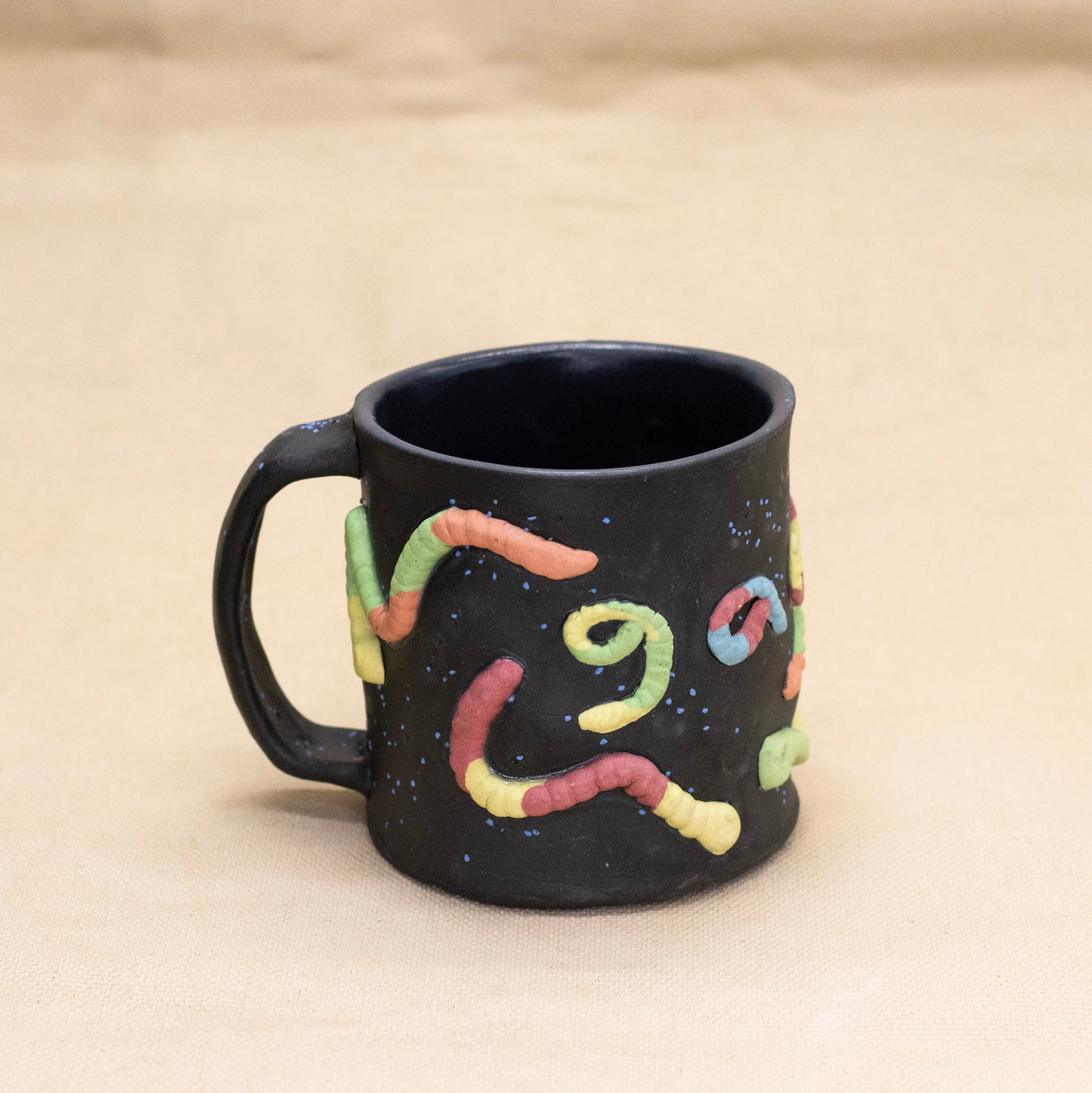 Gay Gummy Worm Mug by Amber Frances