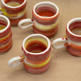 Pink and Yellow Mugs by Julie Burmeister