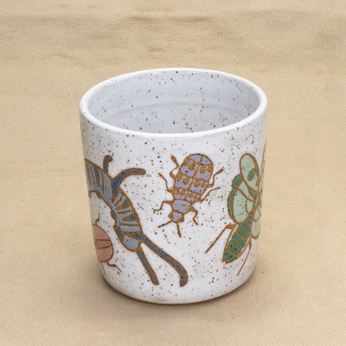 White Bug Cup by Jess Wiseheart