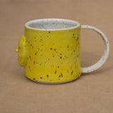 Trapped! Café Cup in Yellow by Jennifer Mayer