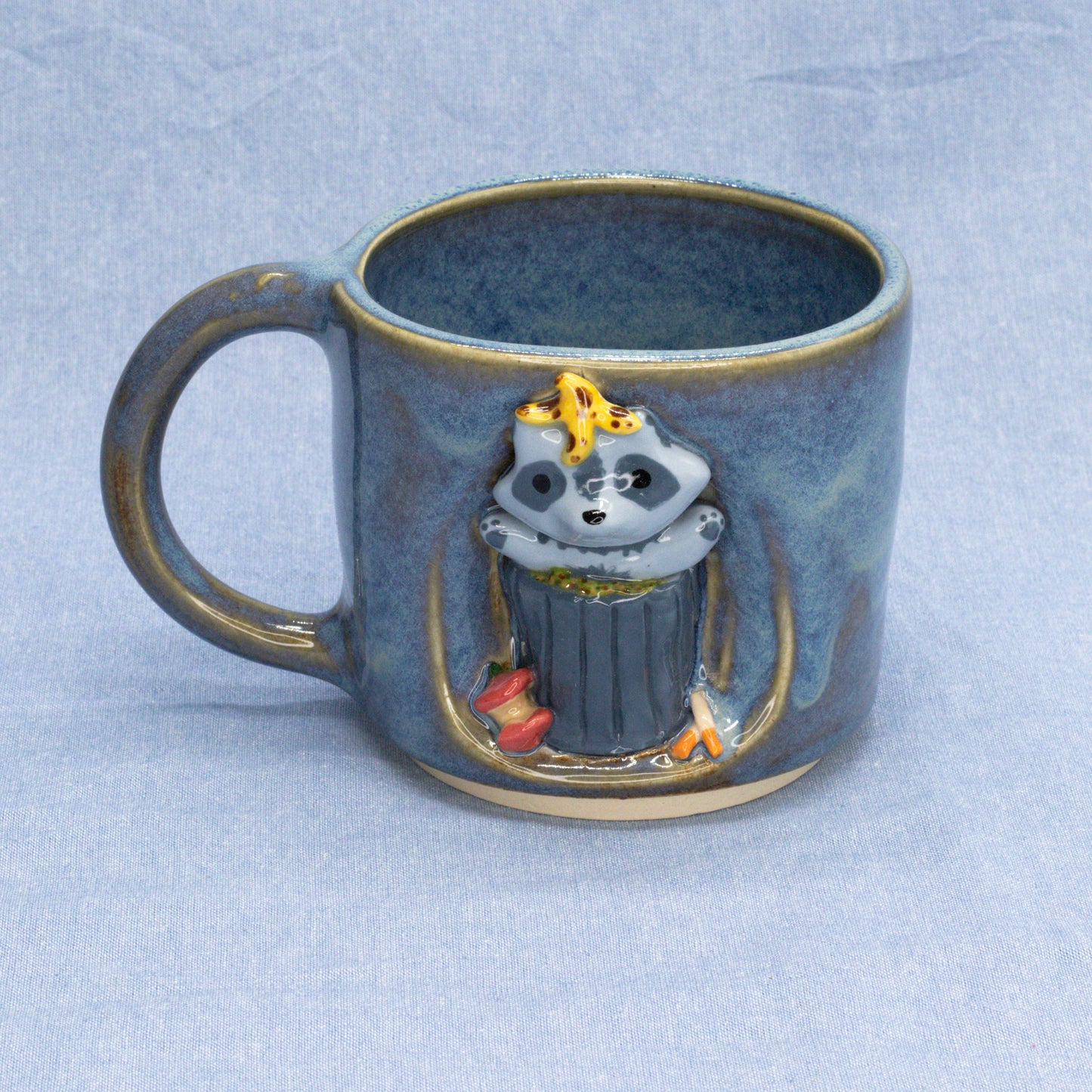 Trash Panda Mug by Capy Clay Ceramics