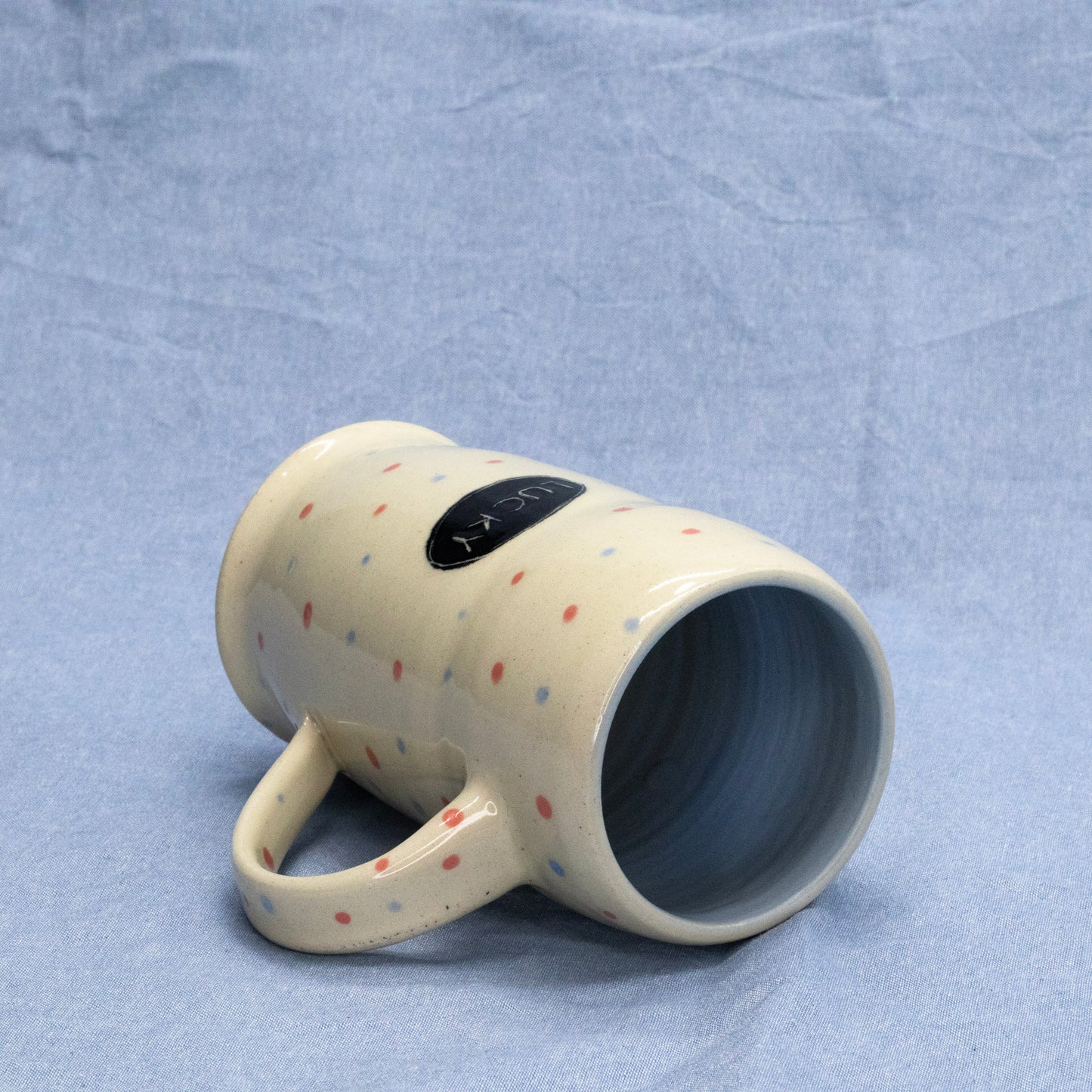 Lucky Polka Dog Cup by Frank Jacques