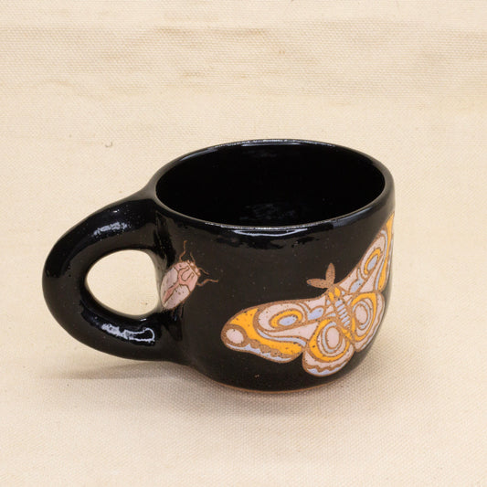 Black Moth and Bug Mug by Jess Wiseheart