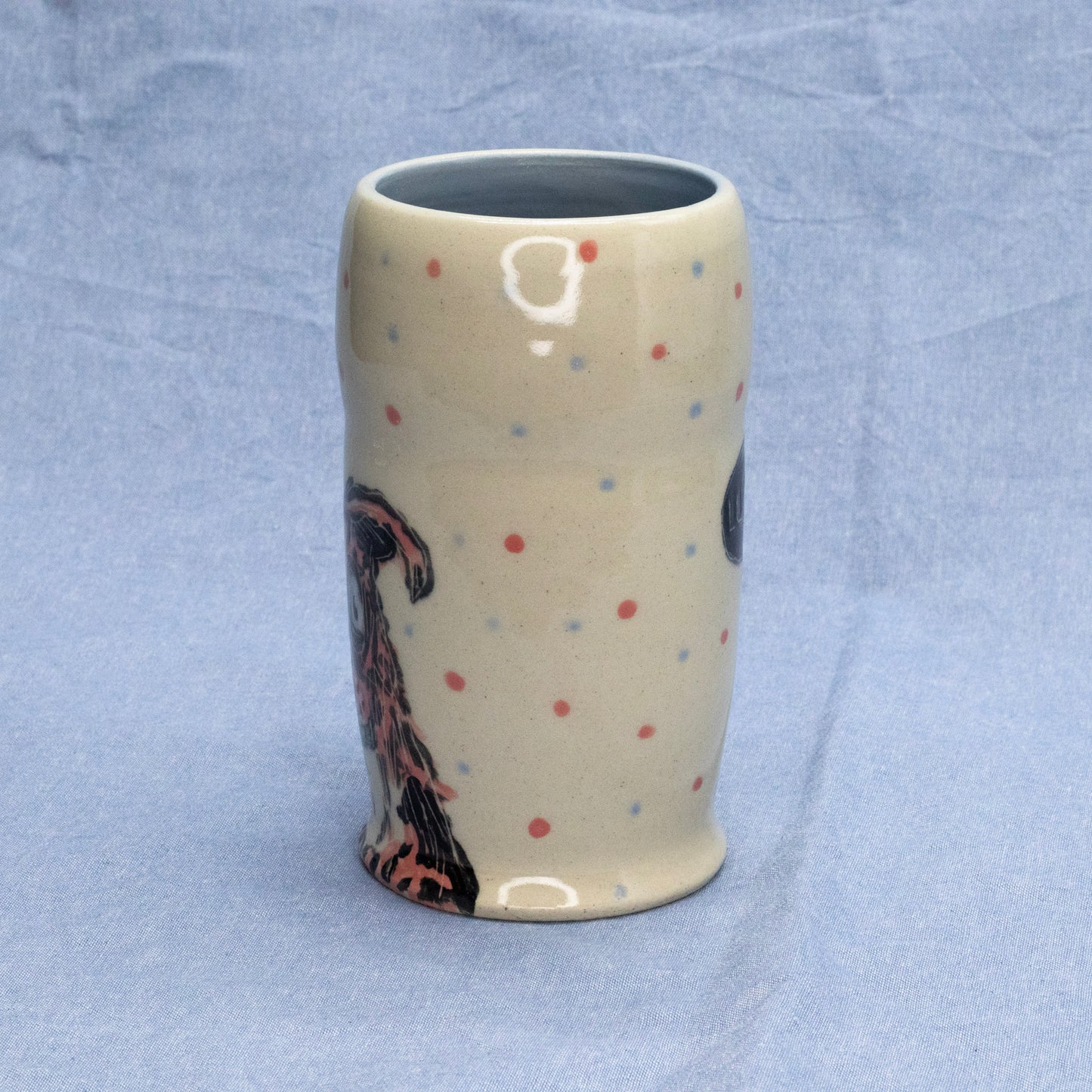 Lucky Polka Dog Cup by Frank Jacques