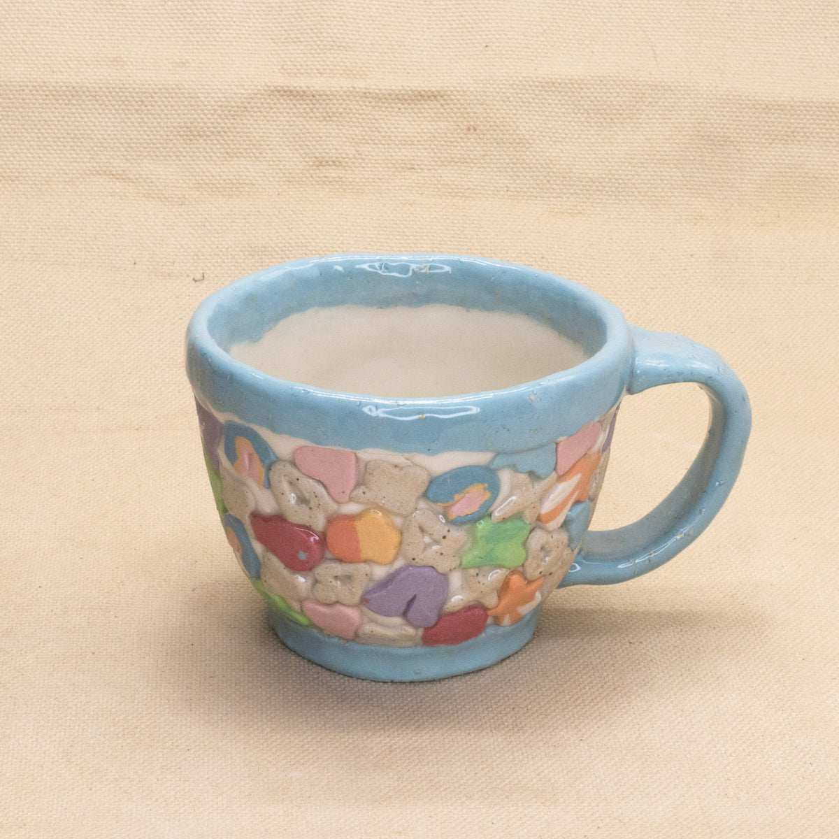 Lucky Charms Mug (Blue Rim) by Amber Frances
