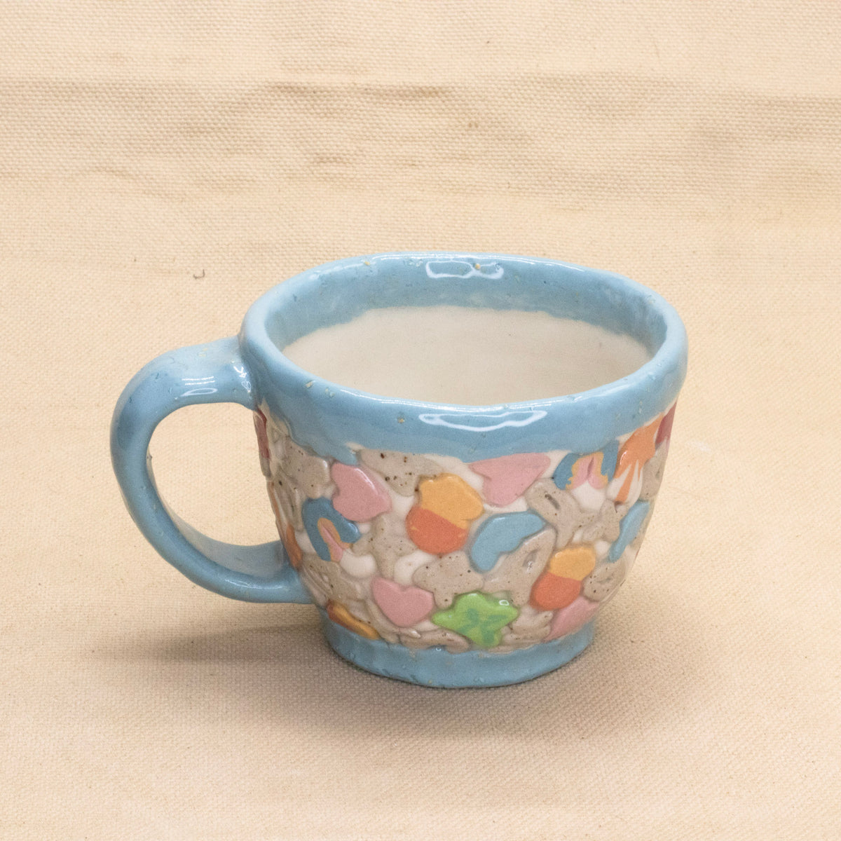 Lucky Charms Mug (Blue Rim) by Amber Frances