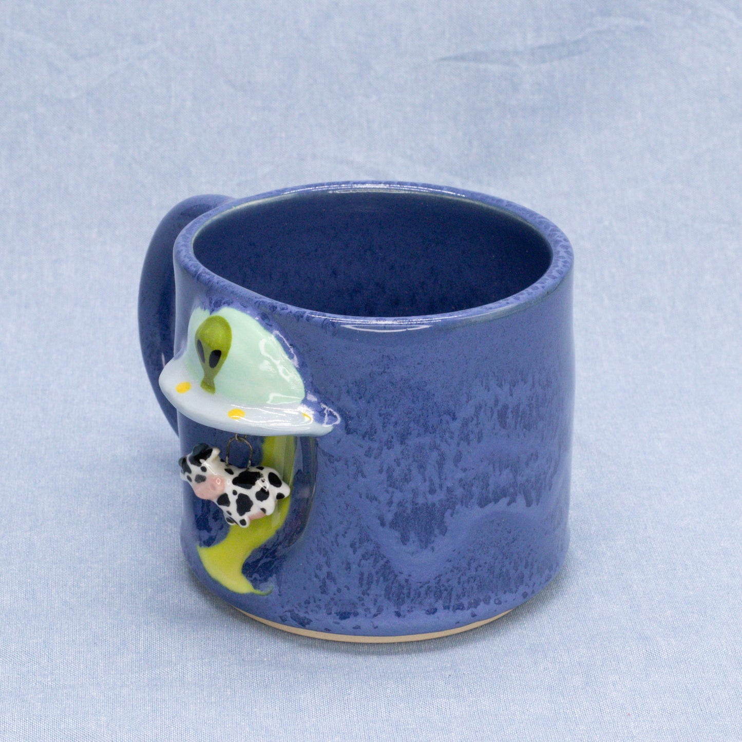 Cow Abduction Mug by Capy Clay Ceramics