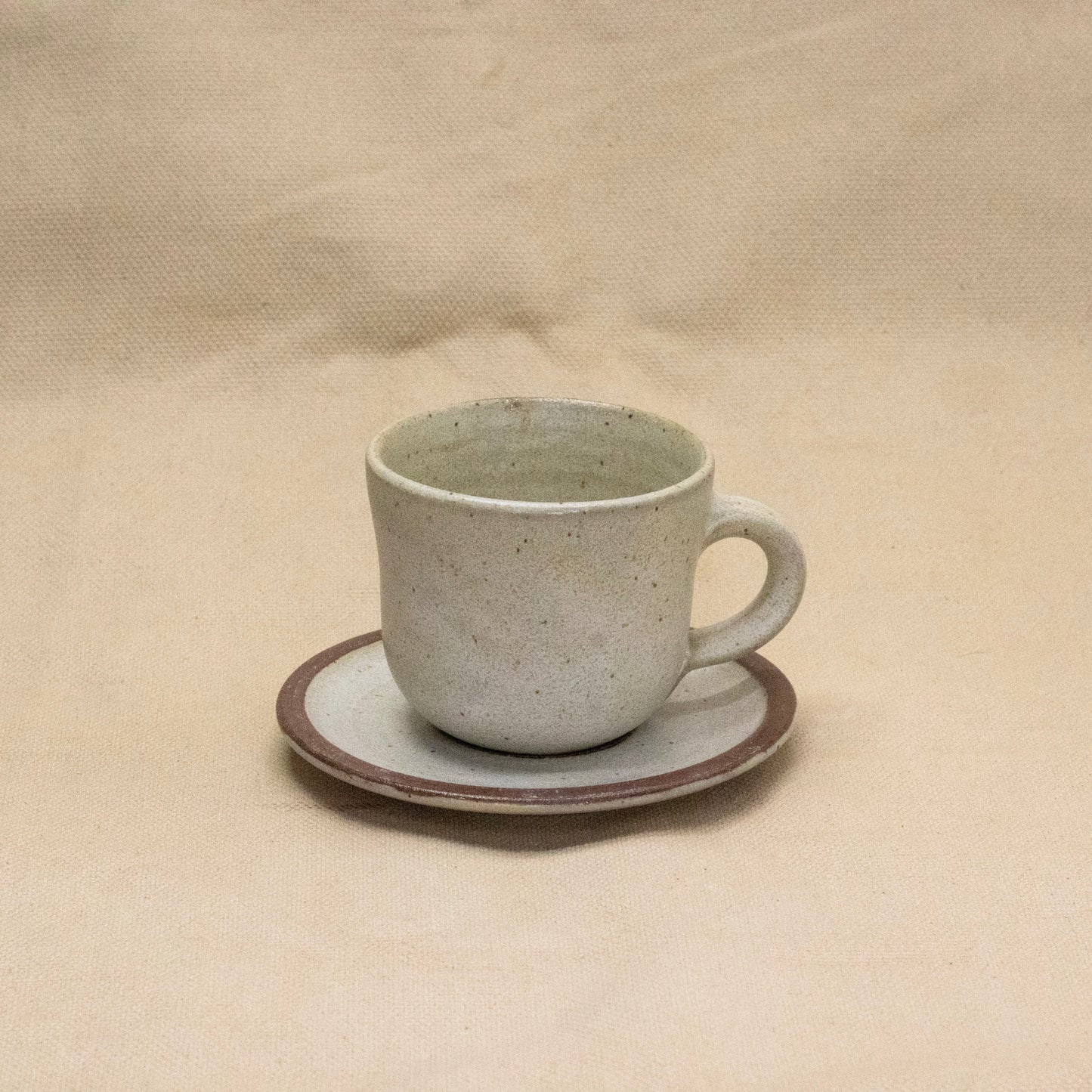 Teacup and Saucer #1 by Cade Hollomon