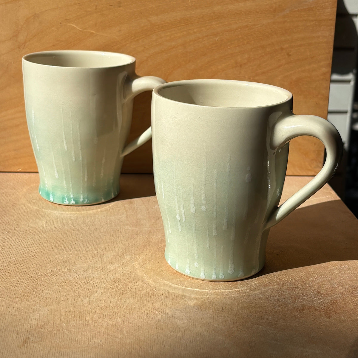 Rain Mugs by Jem Tong