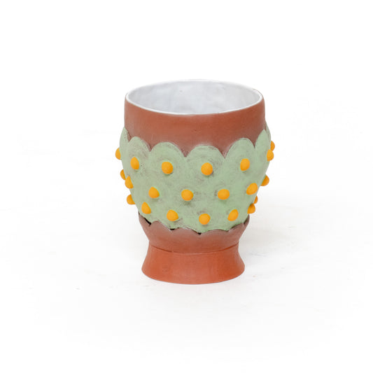 Green Cup-cake with Yellow Sprinkles by Naomi Peterson